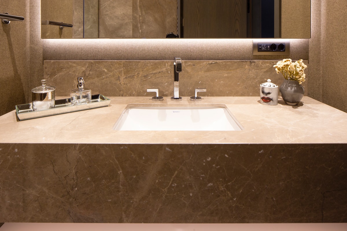 Residential bathroom with marble